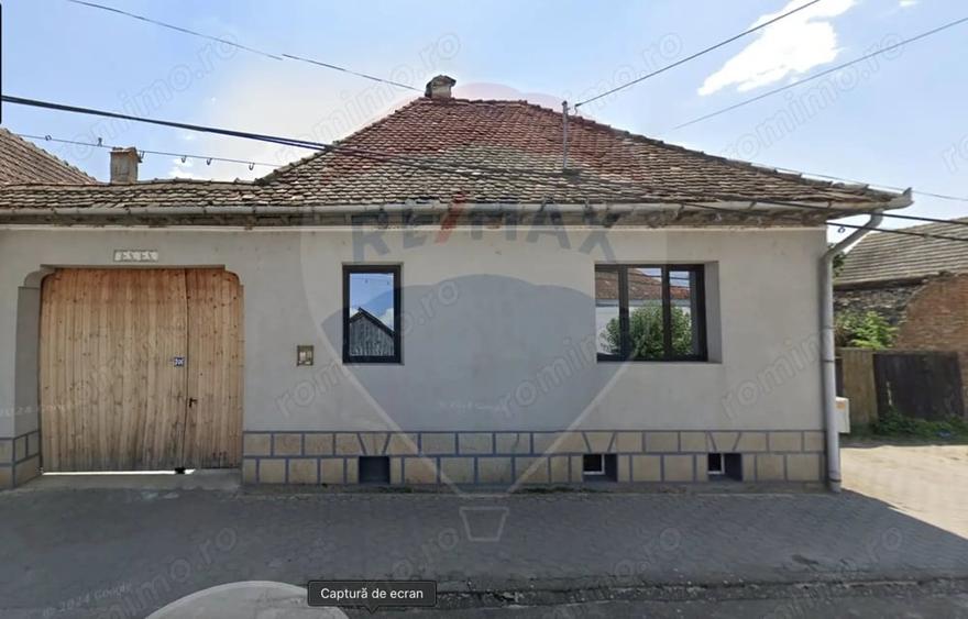 Casă cu 5 camere cu Teren 1346 Mp în Comana