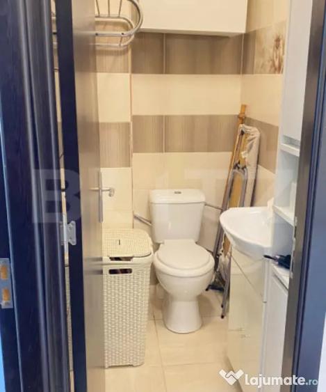 Apartament cu 3 camere decomandat în Tractorul
