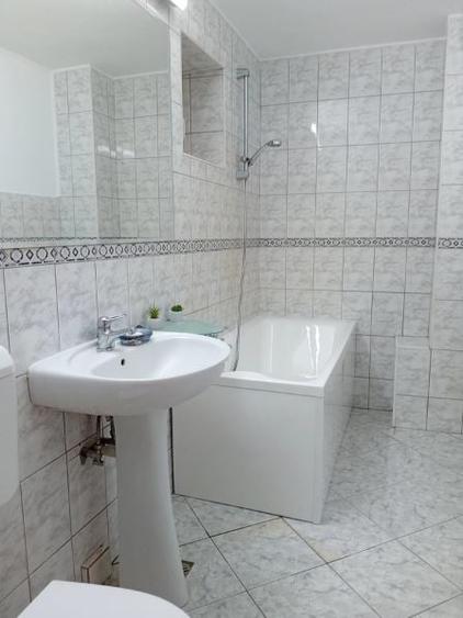 Garsonieră decomandată în P-ța Unirii