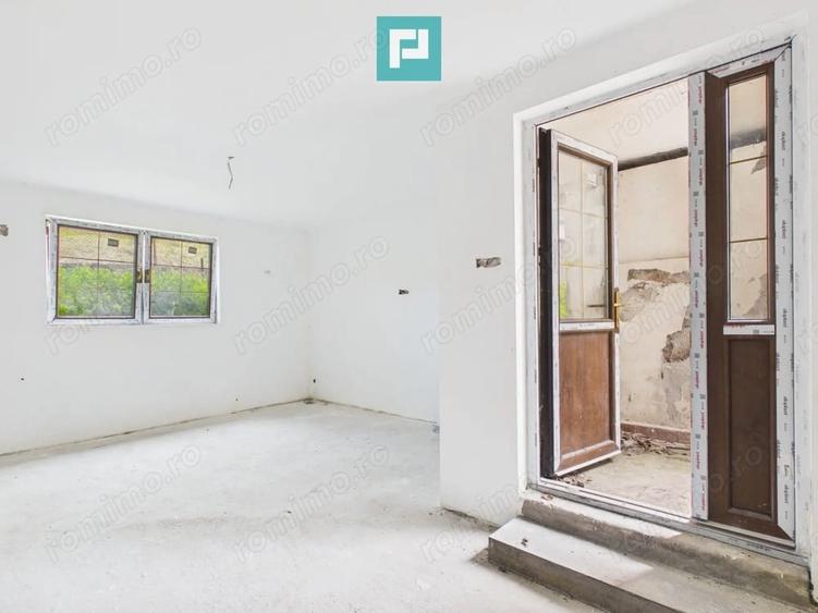 Casă cu 4 camere cu Teren 405 Mp în Romanilor