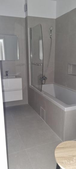 Apartament cu 3 camere semidecomandat în Tunari