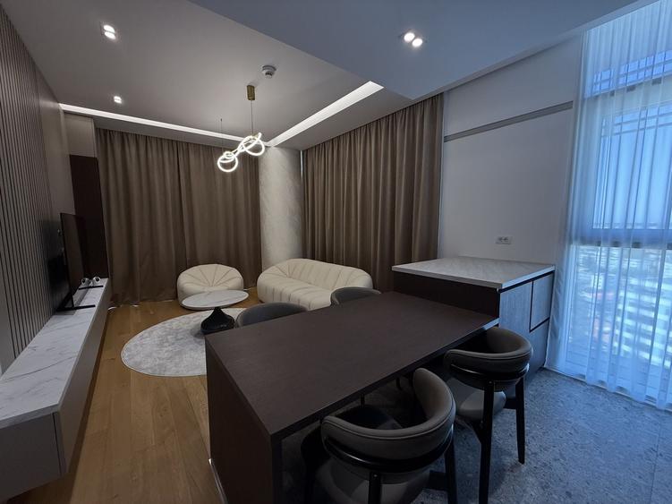 Apartament cu 3 camere semidecomandat, mobilat în Nord