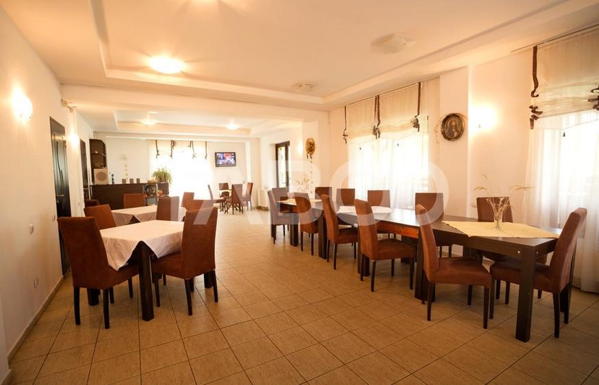 Pensiune 13 camere 16 bai sauna piscina si teren 1565 mp Cisnadioara - 4