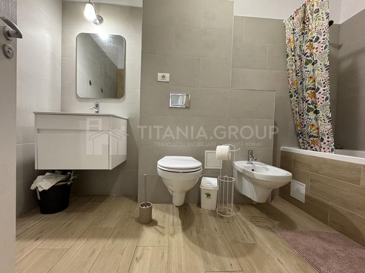 Apartament cu 2 camere semidecomandat, mobilat în Tractorul