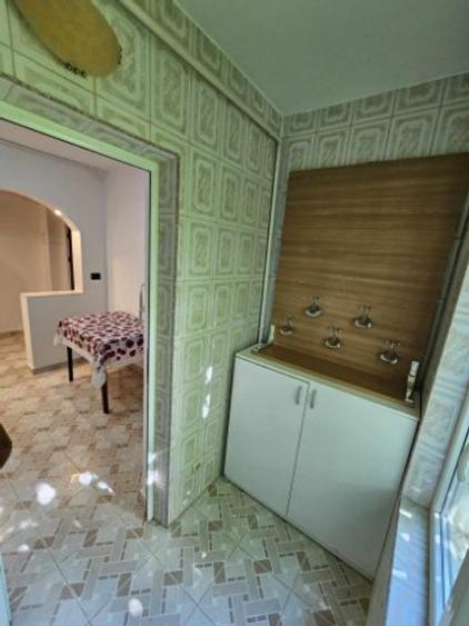 Apartament cu 2 camere decomandat în Roman