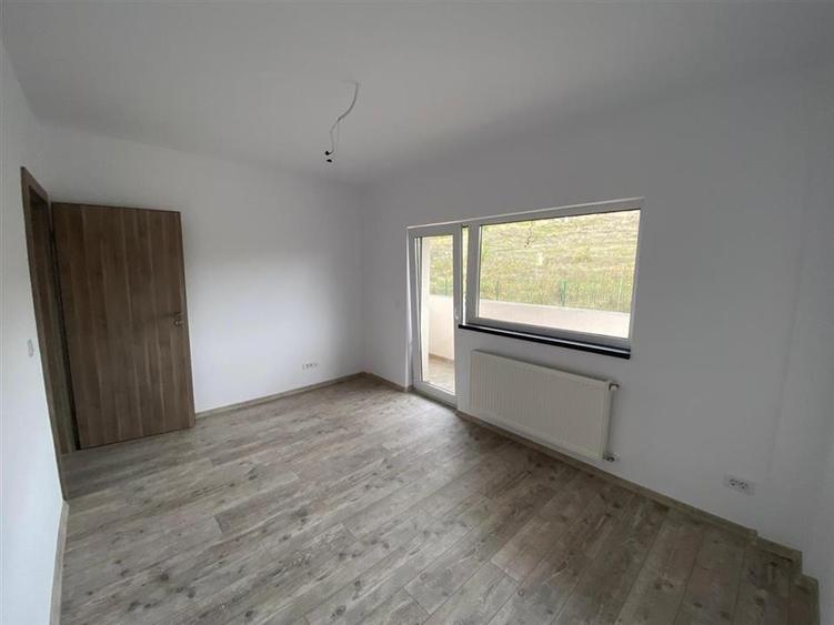Apartament cu 2 camere semidecomandat în Bucium