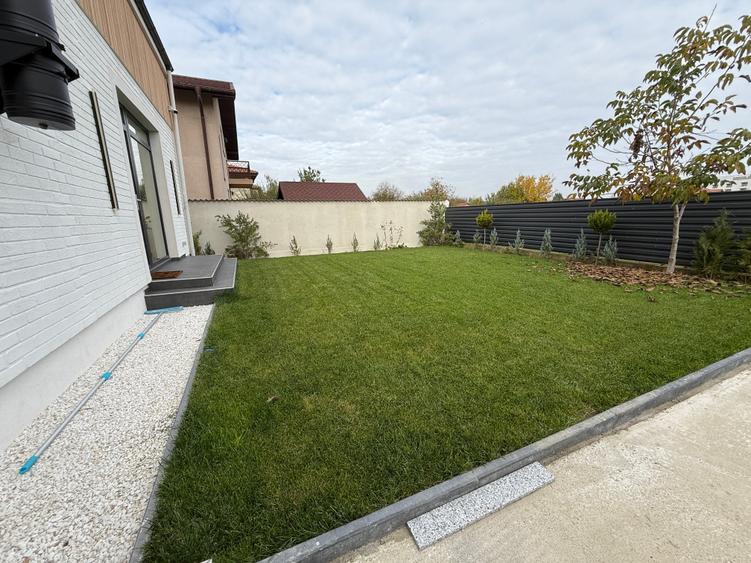 Vilă contemporană , finalizată în 2024, situată pe o stradă privată. - 19