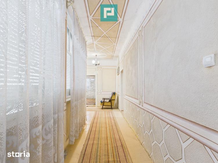 Casă cu 4 camere cu Teren 1473 Mp în Central