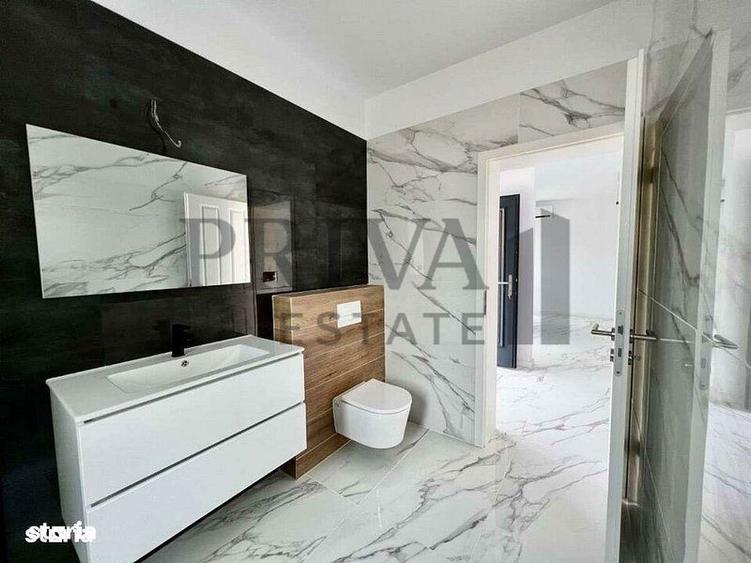 1/2 Duplex 124 mp utili + 330 curte. Dormitor parter,Bucatarie inchisa - 4