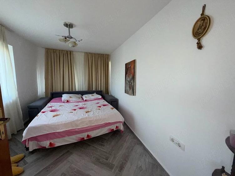 Casă cu 5 camere cu Teren 1000 Mp în Roman