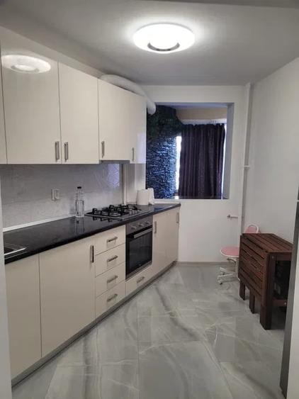 Apartament cu 2 camere semidecomandat, mobilat în Titan