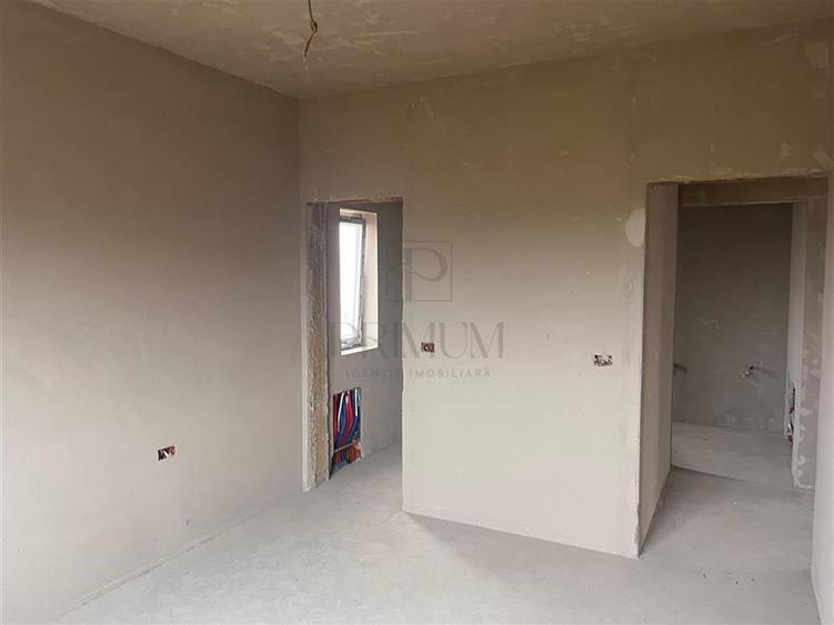 Casa individuala - teren generos - toate utilitatile - living mare - 6