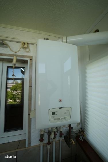 Apartament cu 3 camere decomandat în Titan — fotografia 3