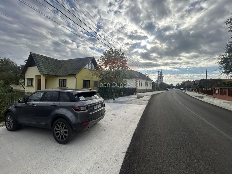 Casa - sura cu 16 ari teren de vanzare in Busag