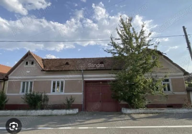 Casa cu cerdac ,gradina mare 3217 si teren 4000 mp un total de 7217 mp.Curent trifazic.