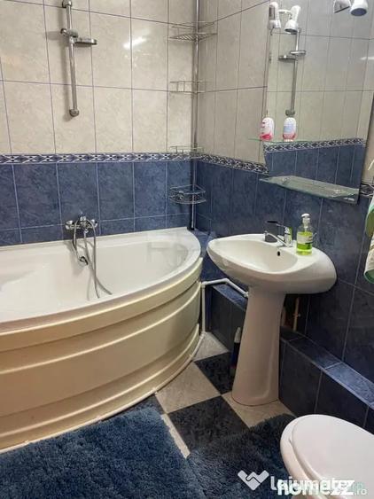 Apartament cu 4 camere semidecomandat în Văcăresti