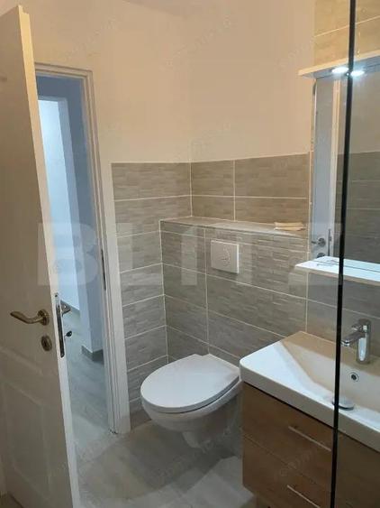 APARTAMENT 3 CAMERE DECOMANDAT IN ZONA DEOSEBITA CU VEDERE SPRE BULEVARD - 2