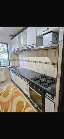 Apartament cu 2 camere semidecomandat, mobilat în Podu Roș