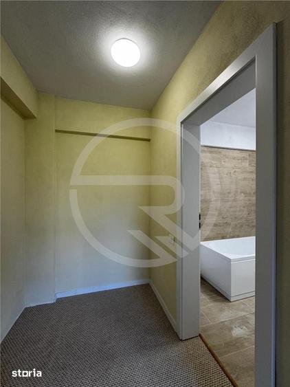 Apartament cu 3 camere semidecomandat în Borhanci