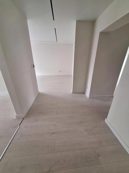 3 camere decomandate Baia Comunala etajul 1 - 6