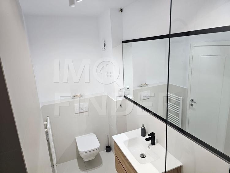 Apartament cu 3 camere semidecomandat, mobilat în Borhanci