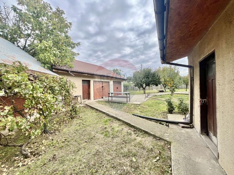 Casa de lemn cu teren generos de 1312 mp de vanzare in Fundulea - 45