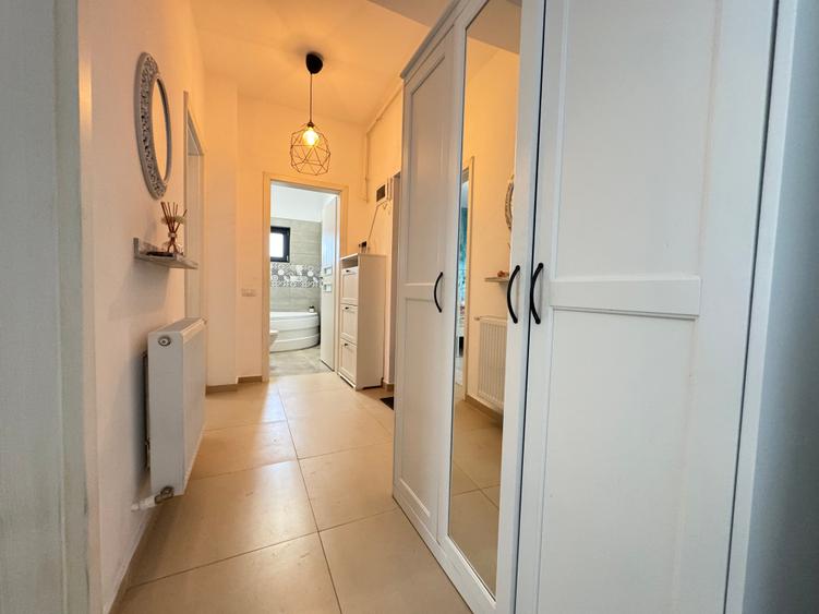 De inchiriat- 2 camere 44mp utili +100mp gradina cu terasa + 2 locuri de parcare - 12