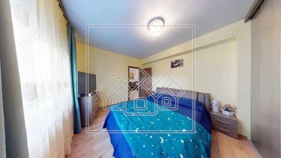 Ap.cu 3 camere, 2 bai si balcon, etaj intermediar, mobilat si utilat - 10