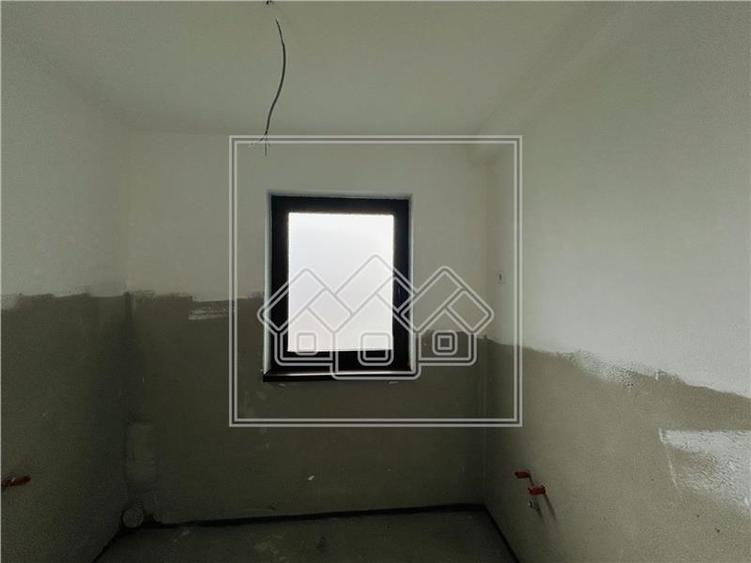 Casa de vanzare in Sibiu - 121 mp utili + 247 mp teren - 14