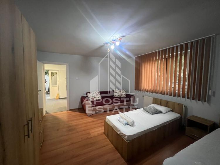Apartament cu 2 camere semidecomandat, mobilat în Ghiroda