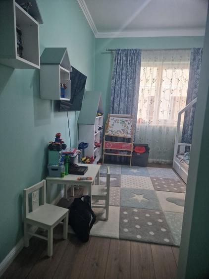 Etaj 1. Bucatarie inchisa. 2 Bai. 2 Locuri de Parcare. - 11