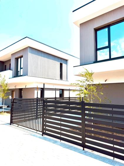 Vila moderna 4 camere, 3 bai, curte 150 mp + 2 locuri parcare, clasa A, Chitila