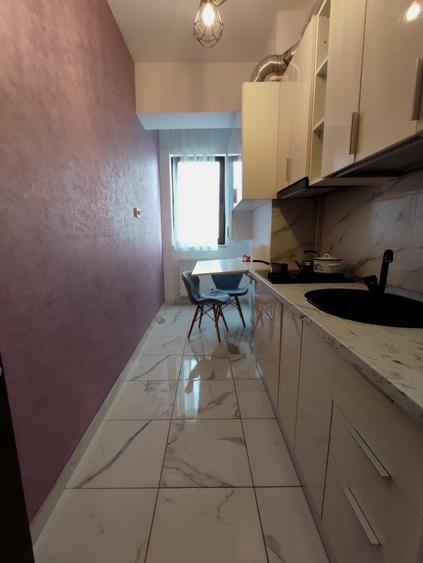 Apartament cu 2 camere semidecomandat, mobilat în Central
