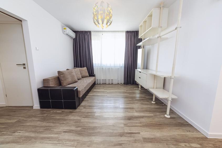 Apartament cu 3 camere semidecomandat, mobilat în Grivița