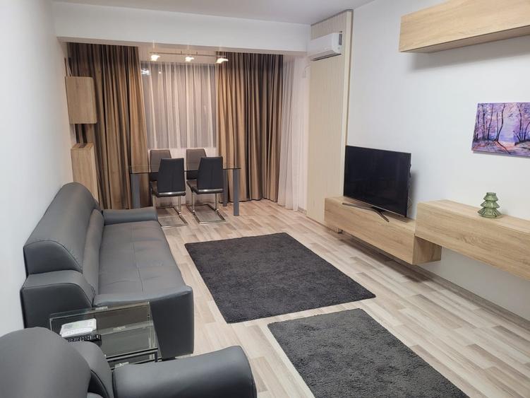 Apartament cu 2 camere, mobilat si utilat. Prima inchiriere. Loc de parcare - 2