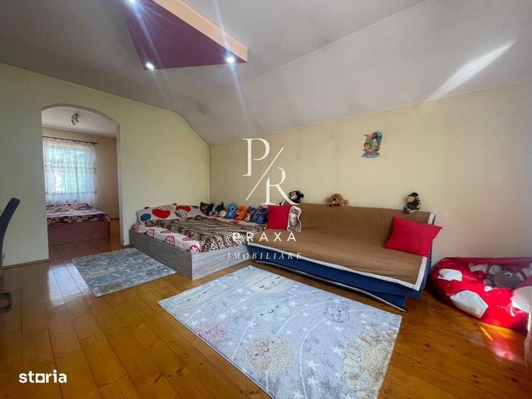 Casa individuala, impreuna cu spatiu comercial amplasata pe un teren d - 1