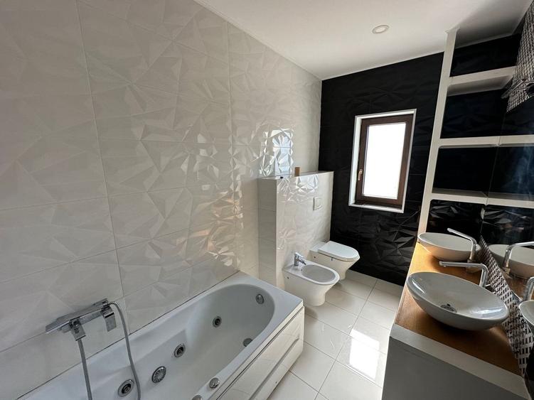 CASA SPATIOASA  CU GARAJ SI TEREN DE 600 MP - 12