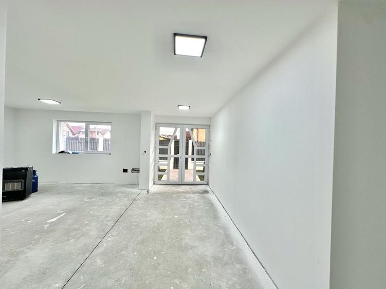 Casă individuală de vanzare  cu garaj și curte proprie – Hălchiu - 4