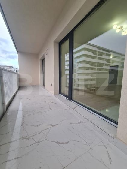 Apartament cu 2 camere, finisaje noi, terasa, parcare subterana, zona centrala - 1