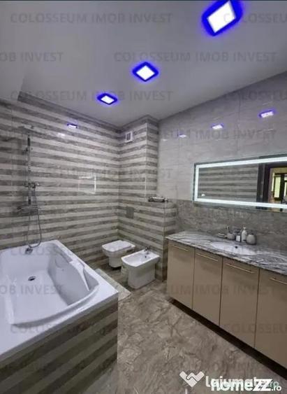 Apartament cu 3 camere decomandat în Tractorul