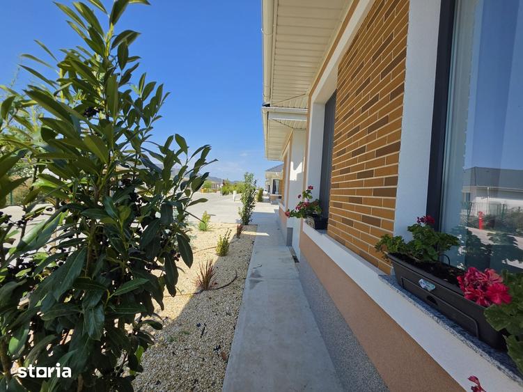 Casă cu 4 camere cu Teren 500 Mp în Tunari