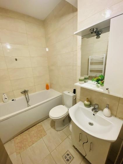 Apartament cu 2 camere semidecomandat, mobilat în Central