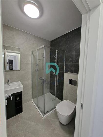 Apartament cu 3 camere decomandat în Tractorul