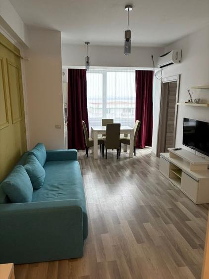 Apartament cu 2 camere semidecomandat, mobilat în Central