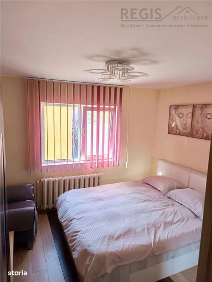 Apartament cu 3 camere decomandat în Tractorul