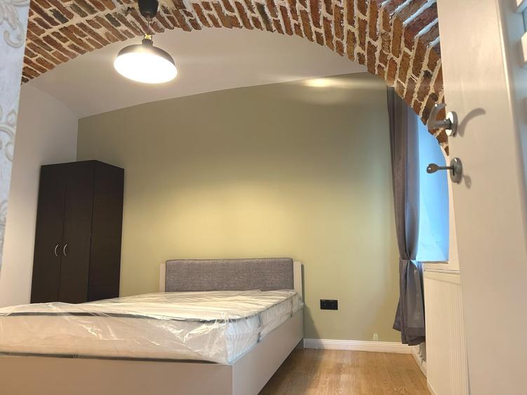 Apartament cu 2 camere semidecomandat, mobilat în Centrul Istoric