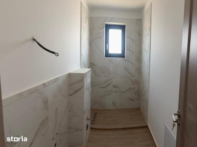 Casă cu 4 camere decomandat cu Teren 220 Mp în Tărlungeni