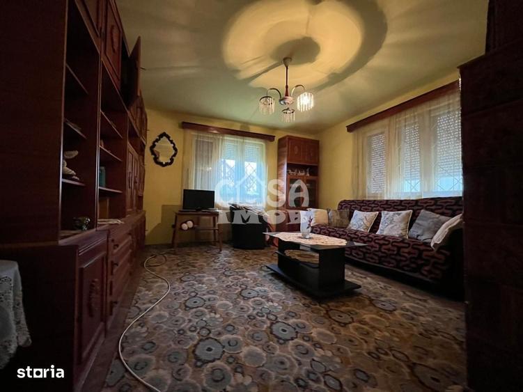 Casă cu 4 camere decomandat cu Teren 980 Mp în Sud