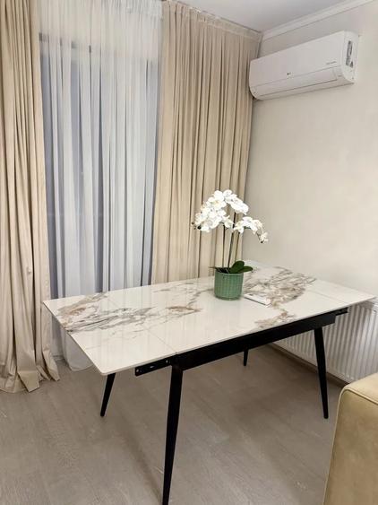 Apartament cu 3 camere semidecomandat, mobilat în Otopeni