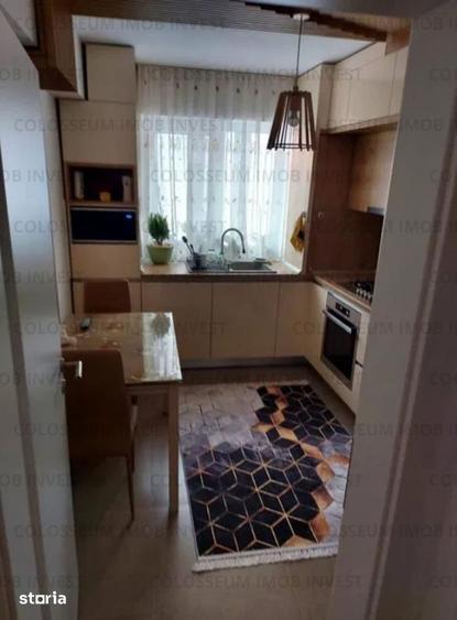 Apartament cu 3 camere decomandat în Tractorul